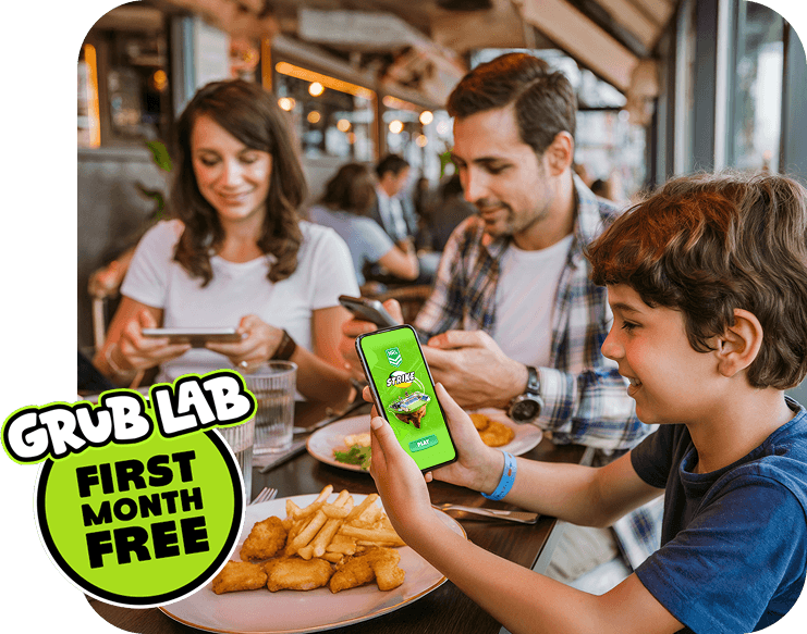 Happy kids enjoying their Grub Lab menu at a restaurant